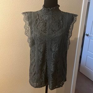 Lace top in Moss Green. Never worn but took off tags
